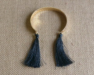 Gold cuff tassels