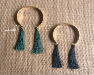 Gold cuff tassels